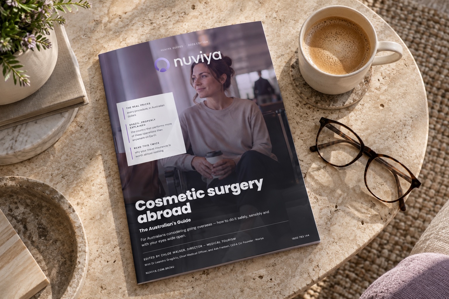 Cosmetic Surgery Abroad: The Australian's Guide — printed guide mock-up on a stone table