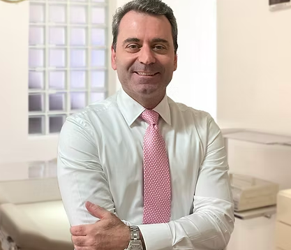 Dr. Carlos Scarfon